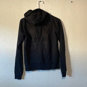 Black zip up. Good condition.